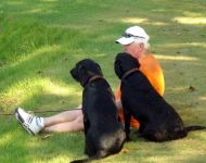 john jordan with his dogs fishing
