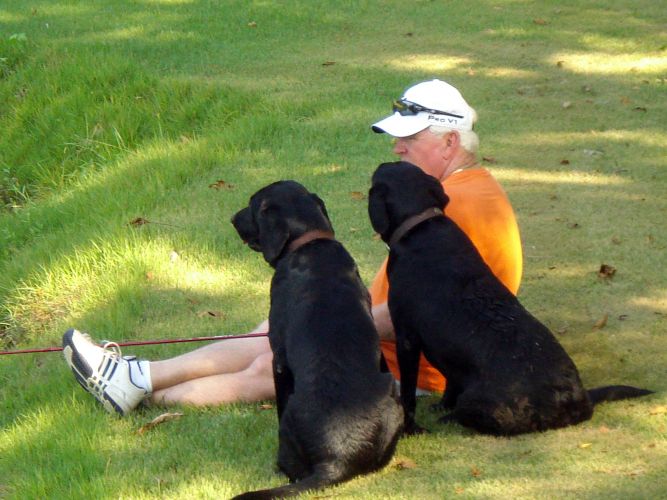 john jordan with his dogs fishing